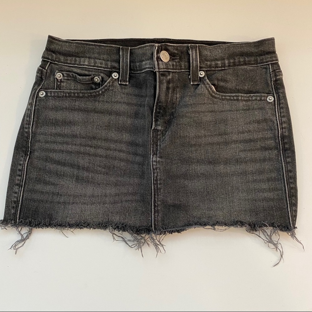 Levi’s size 24” black denim mini shirt